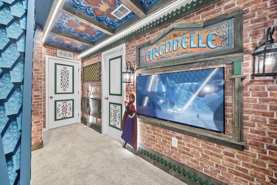 Step into a whimsical environment highlighted by a vibrant mural and charming brick accents. The unique wall decor and thoughtful lighting create an enchanting atmosphere, making this space a delightful introduction to your stay.
