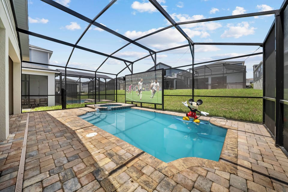 Step outside to your private pool area, a refreshing oasis awaits. Charming paver stones create a warm path around the water, making this enclosed space perfect for sunny days, relaxation, and family fun. Enjoy your time here!