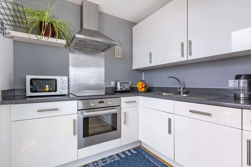 The kitchen is fully equipped to prepare a simple meal 