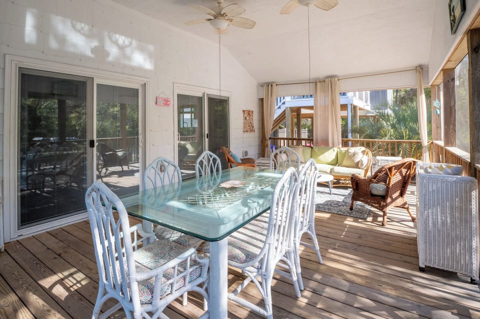 Screened porch living poolside!