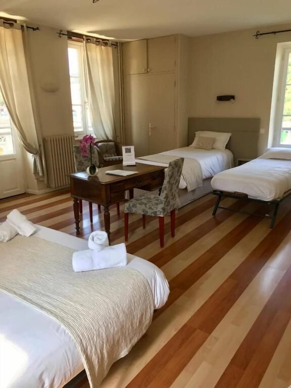 Family Quadruple Room, Balcony, City View | Iron/ironing board, free WiFi, bed sheets, wheelchair access