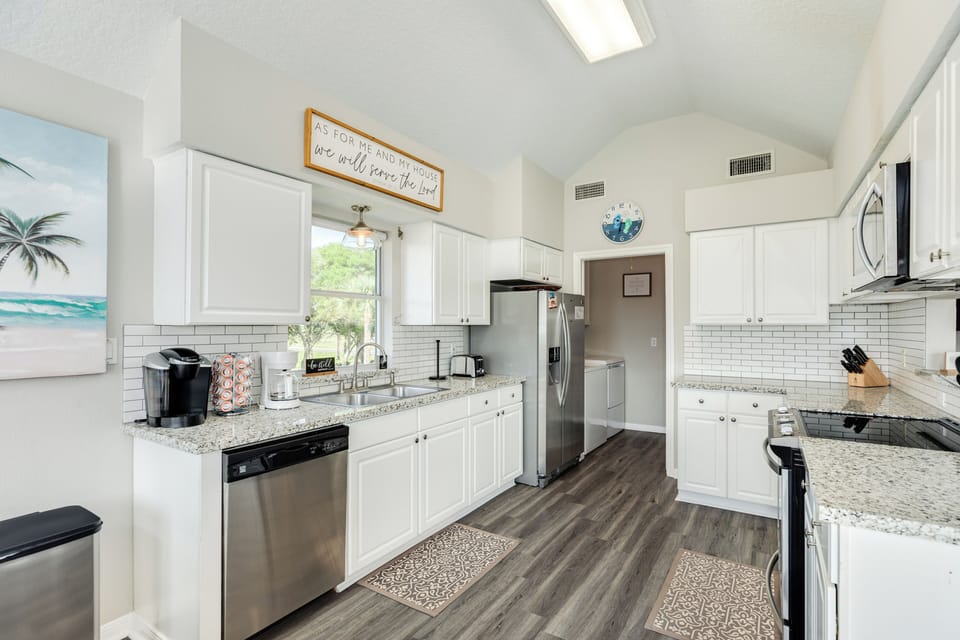 Stainless steel appliances in the fully equipped kitchen