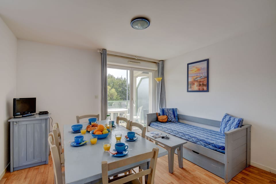 Dining area opening onto the private balcony or terrace.