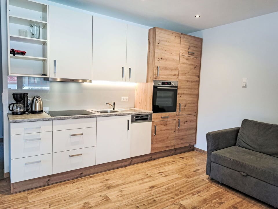 Furniture, Cabinetry, Flooring, Wood, Countertop, Interior Design, Kitchen, Floor, Wood Flooring, Kitchen Appliance