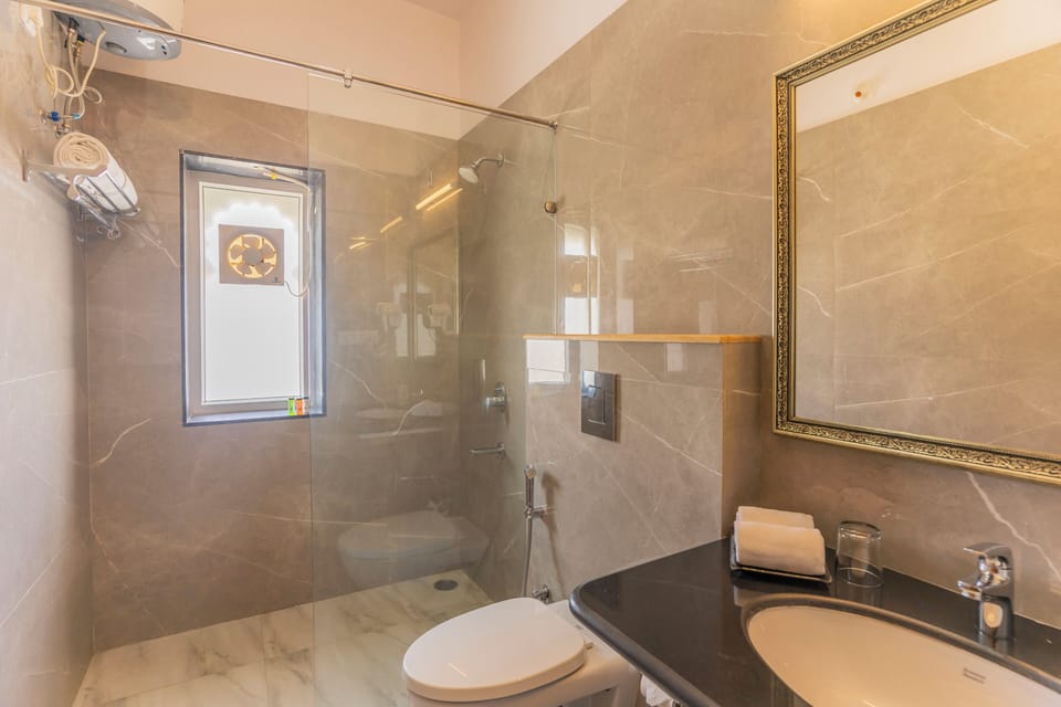 Shower, hair dryer, slippers, towels