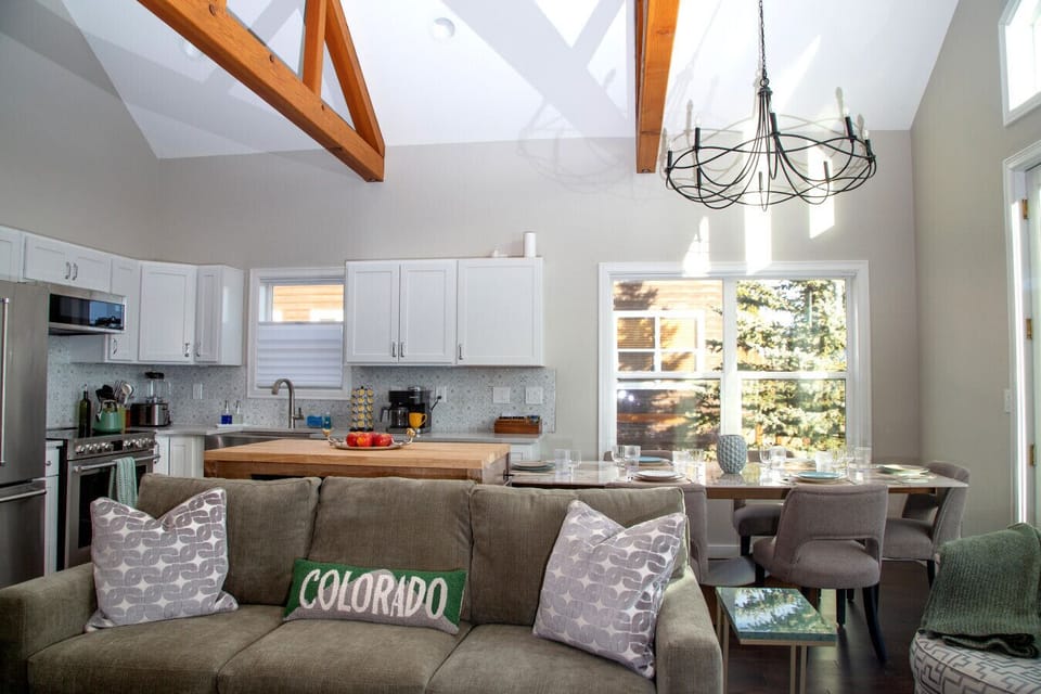 Open concept living room plus kitchen