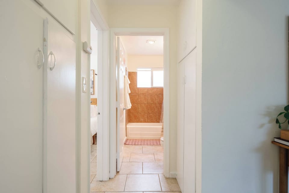 Simple, spotless bathroom designed for comfort and convenience