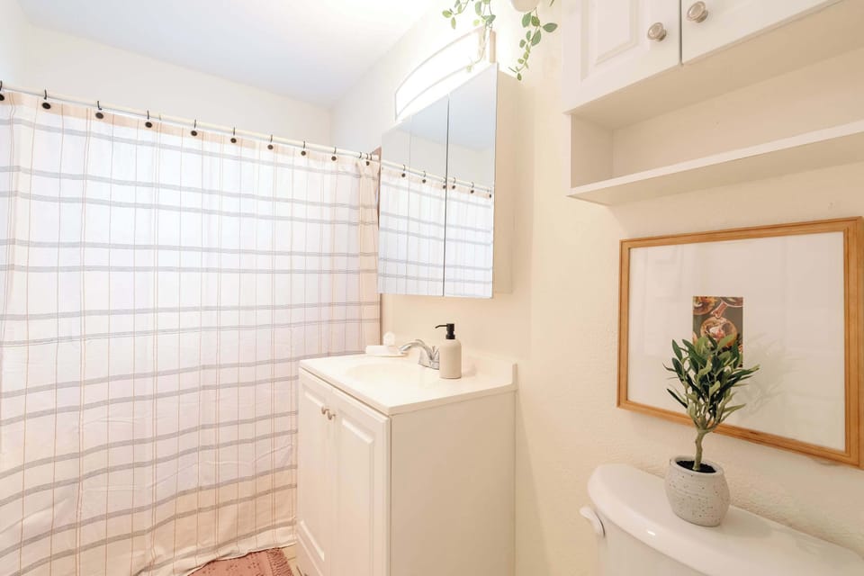 Bright bathroom perfect for rinsing off after beach days