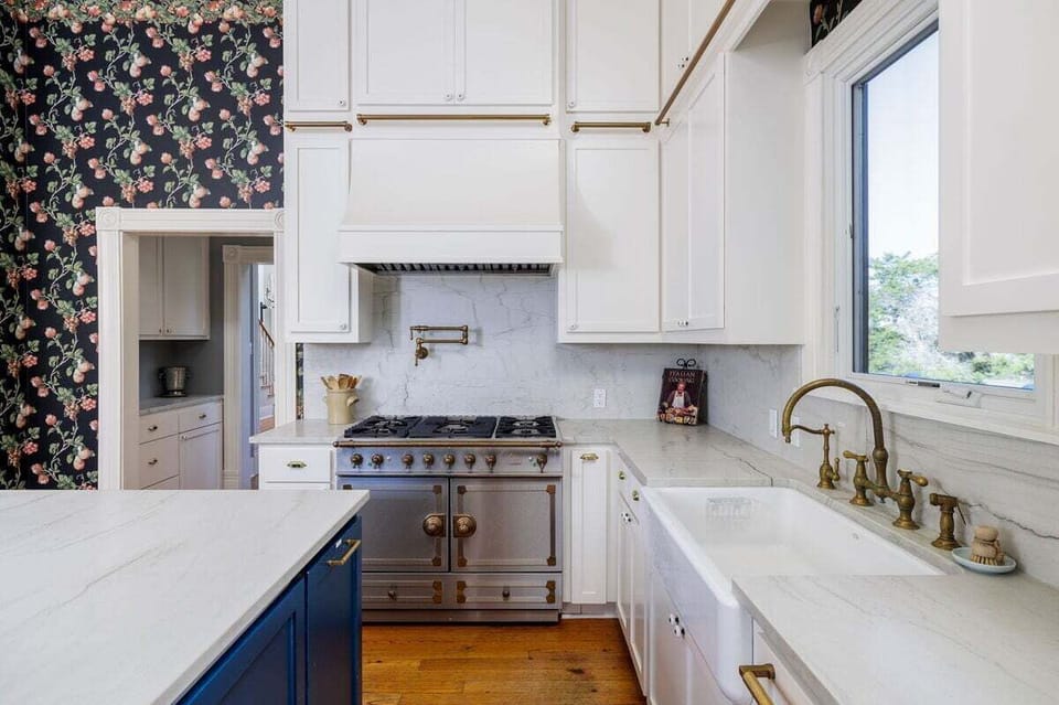 Indulge your inner chef in our well-appointed kitchen, boasting sleek design and functionality for effortless cooking.