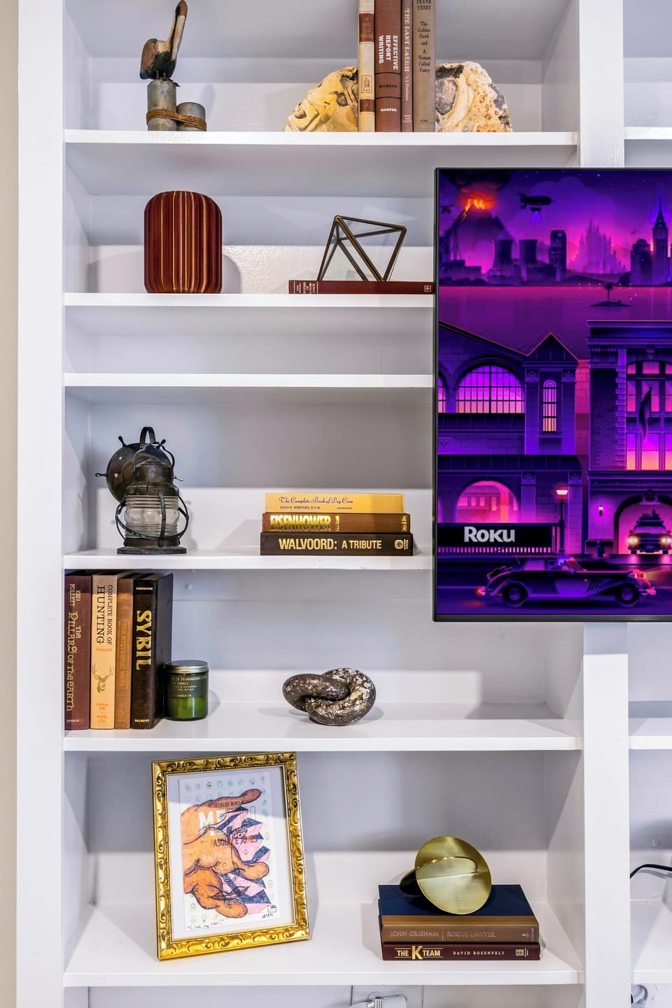 Shelves filled with character, with the TV just in view for easy unwind time.
