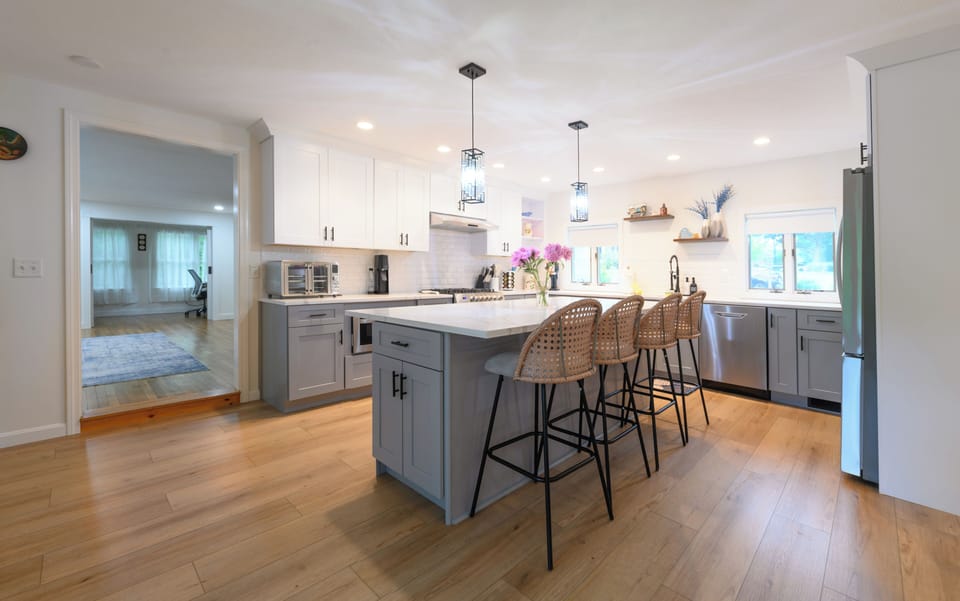 Bright modern kitchen with large island seating for four