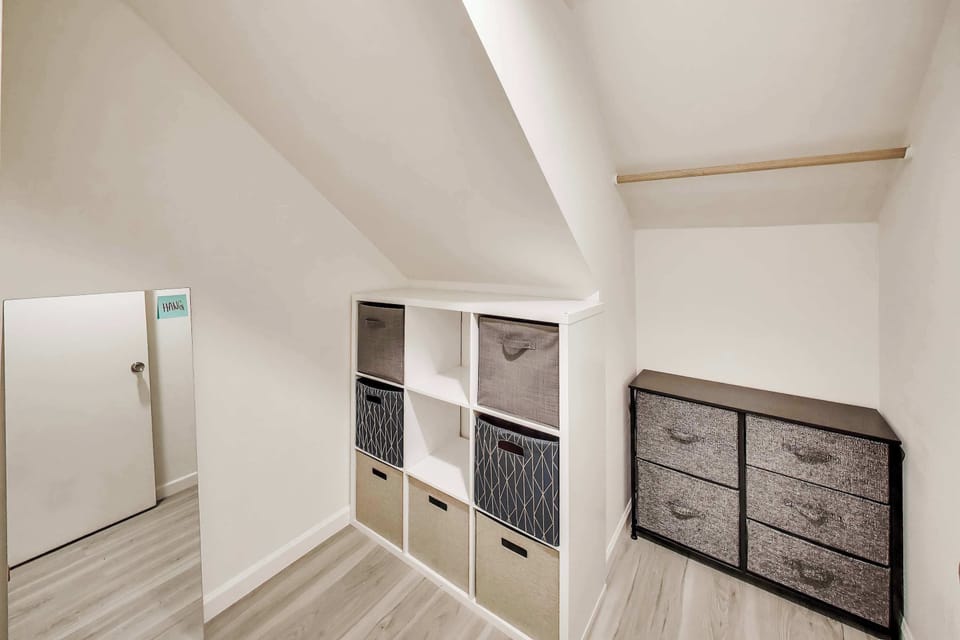 Small bedroom walk-in closet.