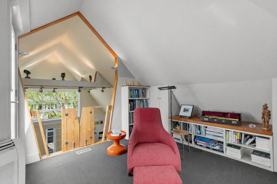 Elevated workspace with light, height, and nature views.
