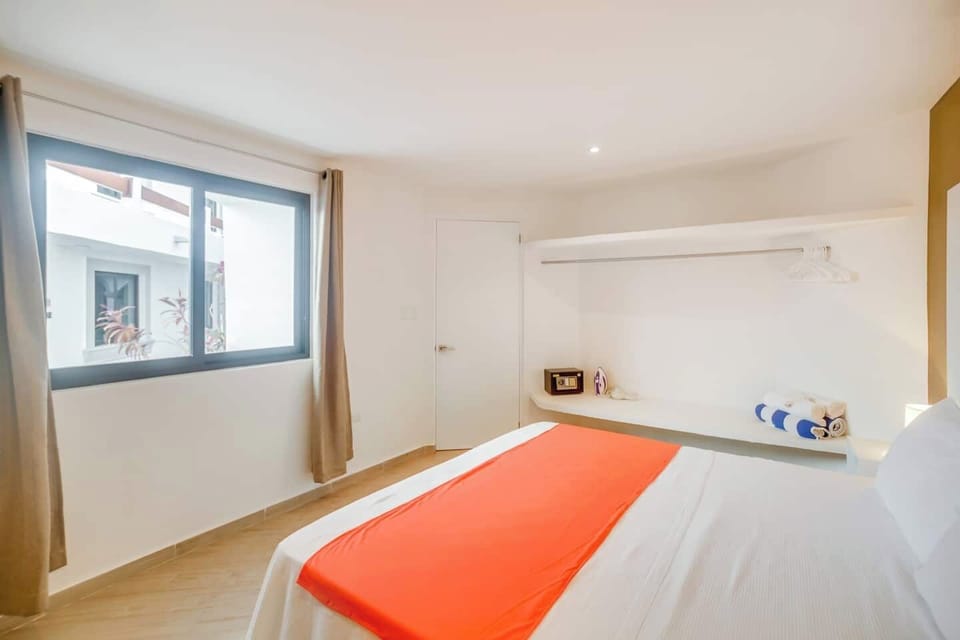 King size bed, also in bedroom a security box, hangers, iron, hair dryer