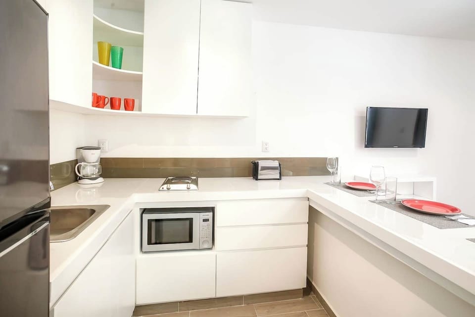 Kitchen, stove, microwave, coffee maker, toaster, refrigerator