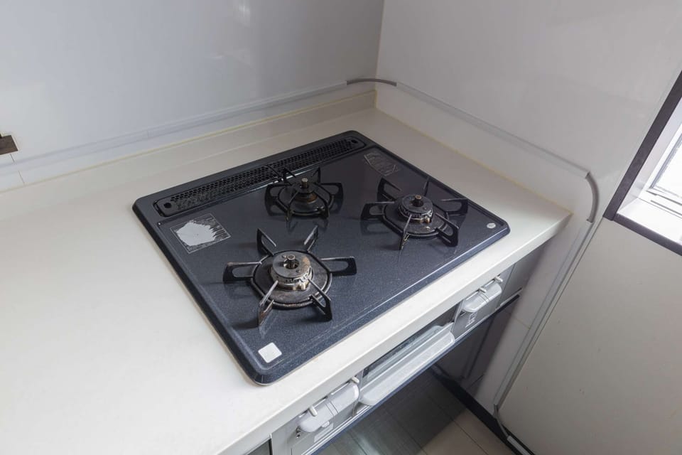 A 3-burner gas cooktop.