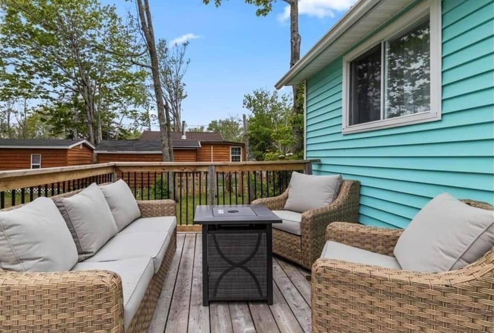 Deck: BBQ, Fire Table, and Patio Furniture.