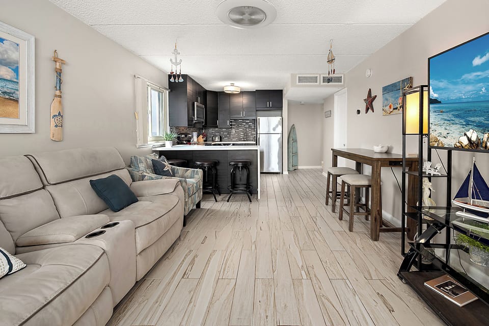 Lounge on the sofa, grab a snack from the kitchen or pull up a bar stool. This open space is made for relaxed, carefree vacation days.