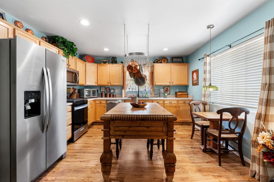 Cooking is a breeze in this fully equipped kitchen, featuring modern appliances and ample counter space.