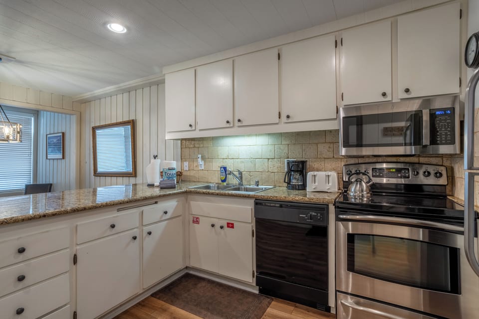 Full kitchen w/ some upgraded appliances.