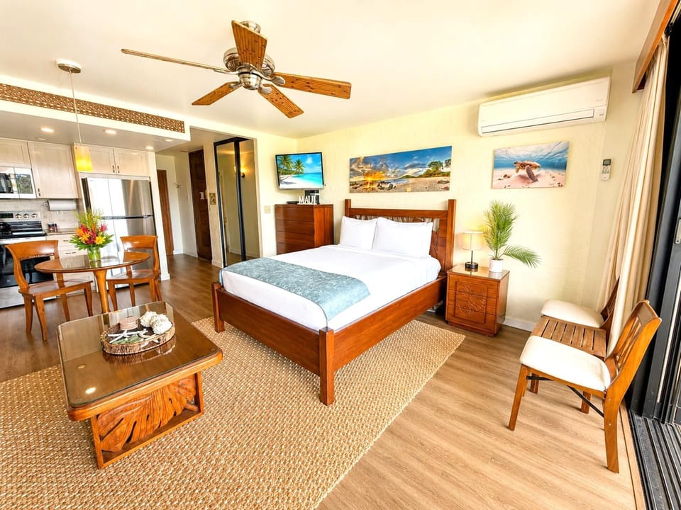 The suite features real wood furniture with gentle island accents PKE-304
