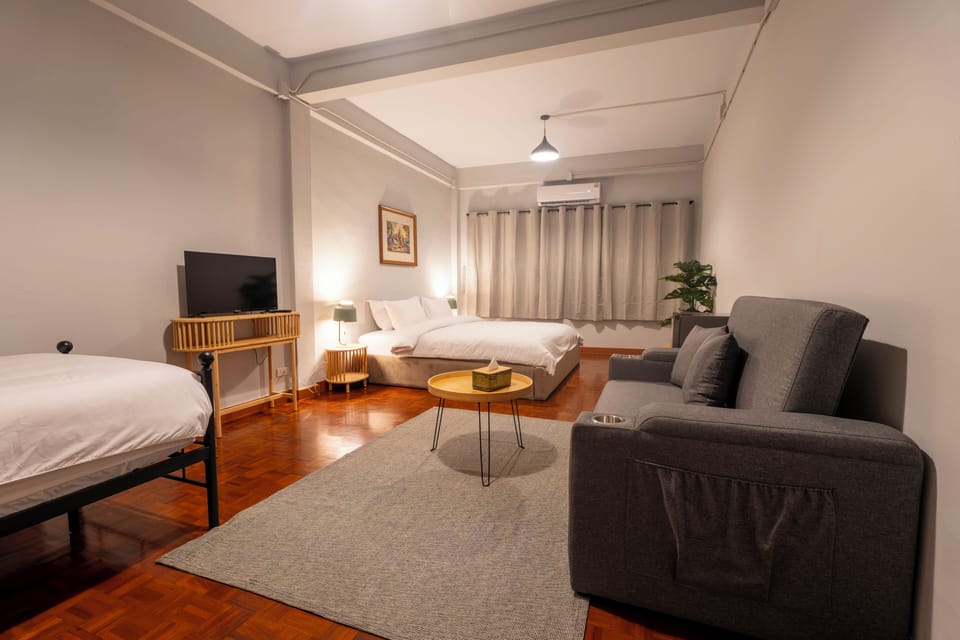 Deluxe Triple Room, Balcony, City View | Iron/ironing board, free WiFi