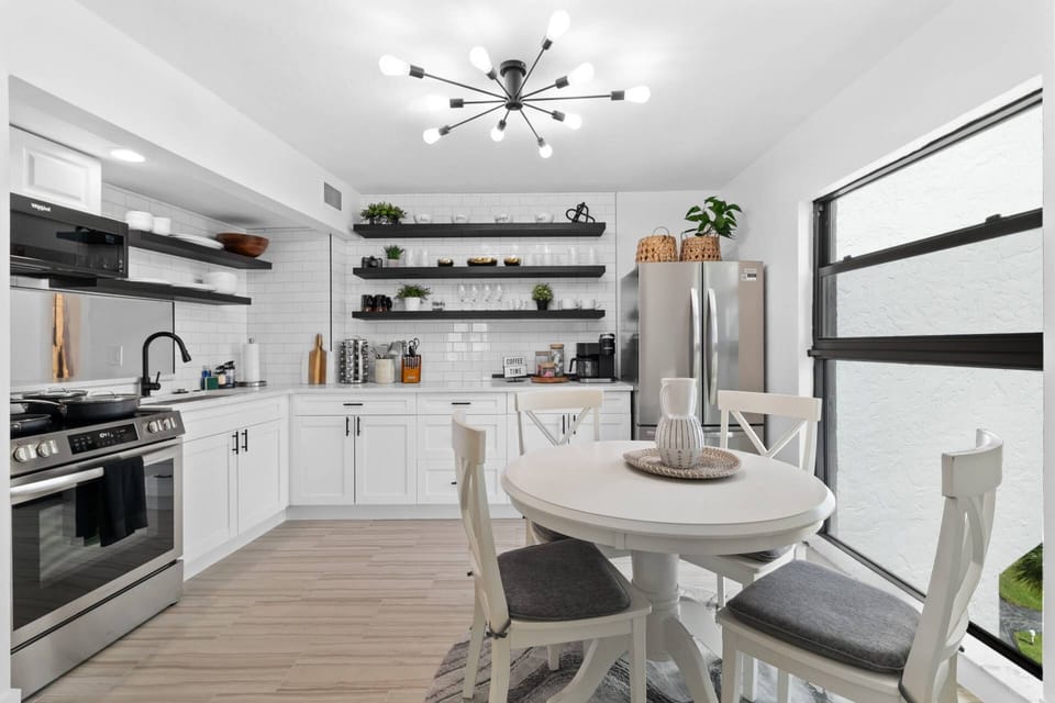 The fully equipped kitchen is ready for any cooking or cocktailing endeavor.