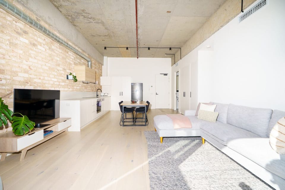 Stylish living area with generous seating and a clean, contemporary design.