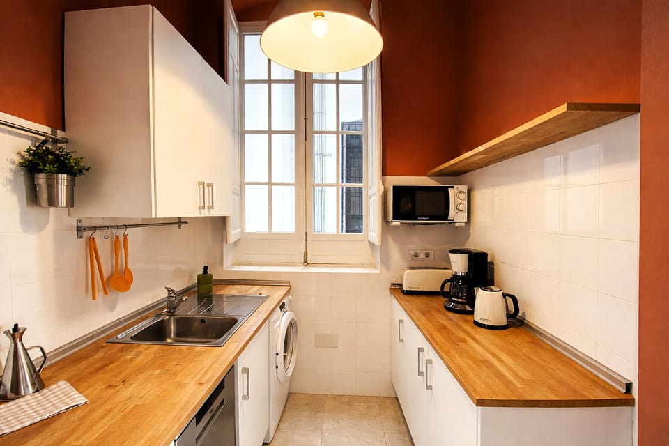 Luxury Apartment, Balcony, City View | Private kitchen | Full-size fridge, microwave, stovetop, dishwasher