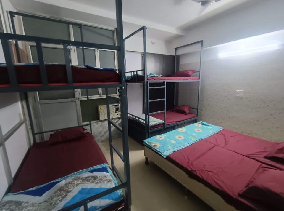 Premium 1 in 4 Bed Mixed AC Dormitory Room | Free WiFi