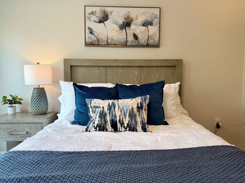 Bedroom 2: queen bed, main floor