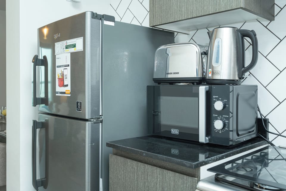 Exclusive Studio, Non Smoking, City View | Private kitchen | Full-size fridge, microwave, oven, stovetop