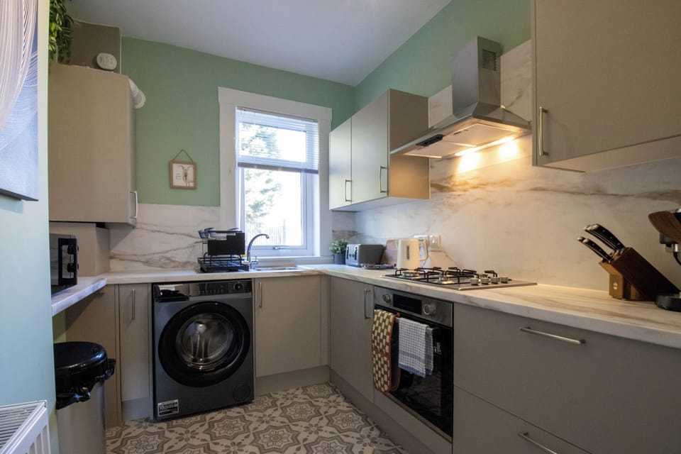 A clean and well-organized kitchen that makes dining in simple and enjoyable.