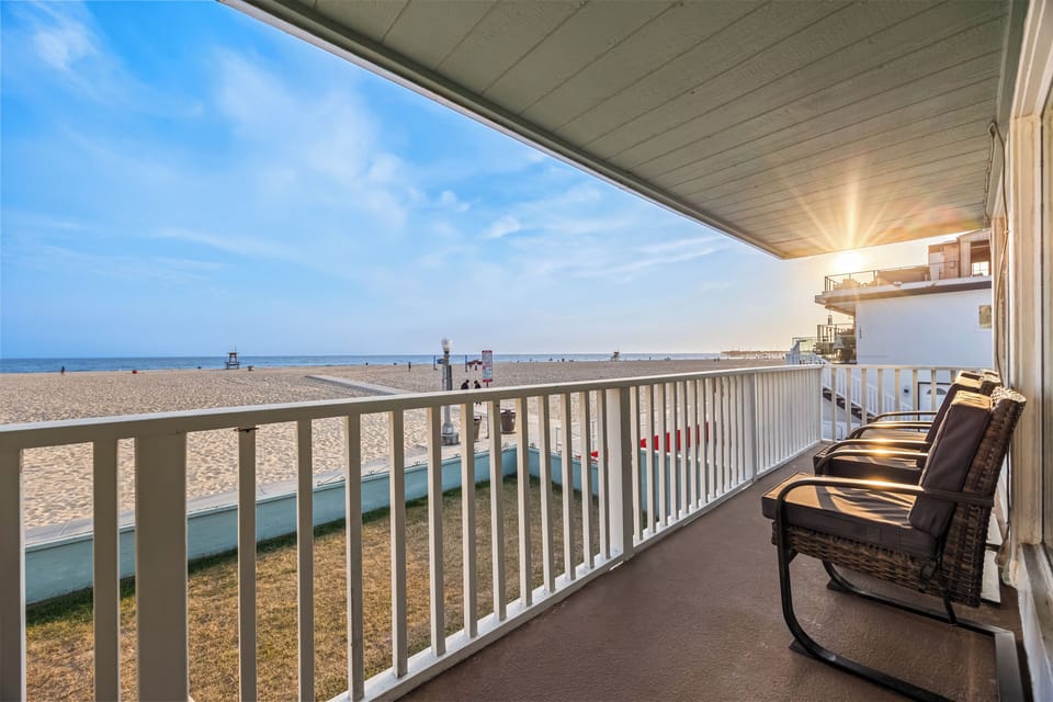 Relax on the private upper-level balcony and soak in the golden hour. This shaded vantage point offers unobstructed views of the sand and surf, making it the perfect spot for your morning coffee or evening wine.