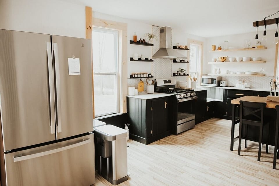 A gas range with a built in air-fryer, a large refrigerator , and all of the small appliances you will ever need are here. Waffle maker, blender, crockpot, toaster, microwave, immersion blender, and dutch ovens too.  