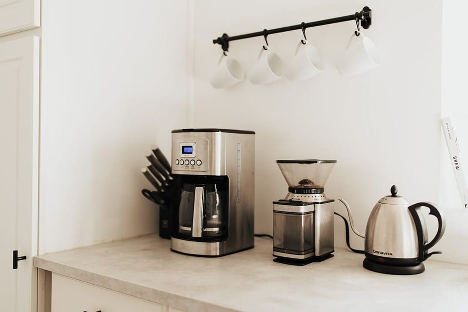 A coffee bar awaits! Drip, french press, chemex or pour over, we've got all the methods to brew a fab cup o' joe; grinder and scale too! 

Also, freshly roasted organic coffee locally roasted by Seneca Sunrise Coffee is complimentary with your stay!