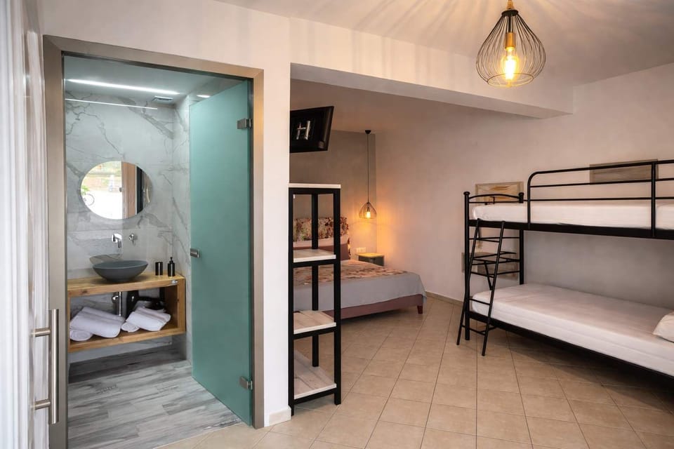 Bathroom entrance from the studio, showing the connection between the main space and the bathroom area.