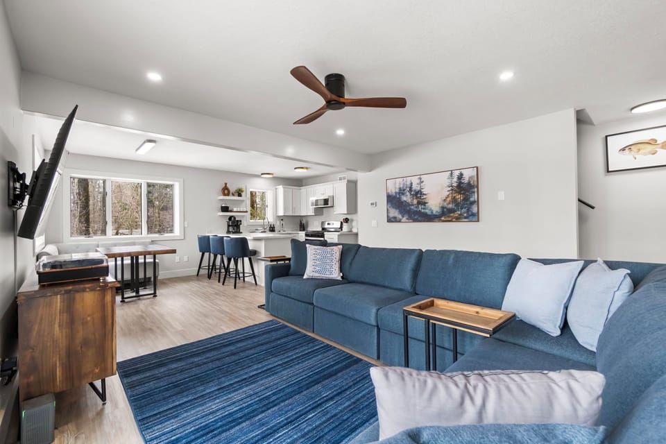 Open-concept main floor — living, kitchen, and breakfast nook