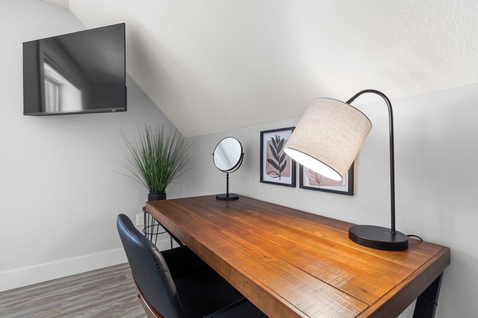 Dedicated workspace with TV — remote work ready