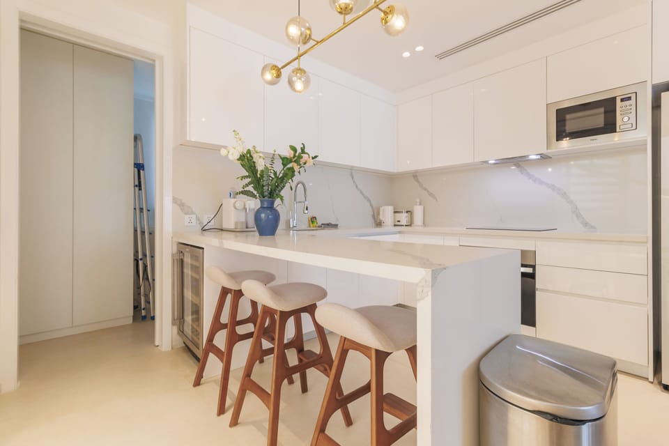 Luxury Apartment, Sea View | Private kitchen | Espresso maker, electric kettle, highchair