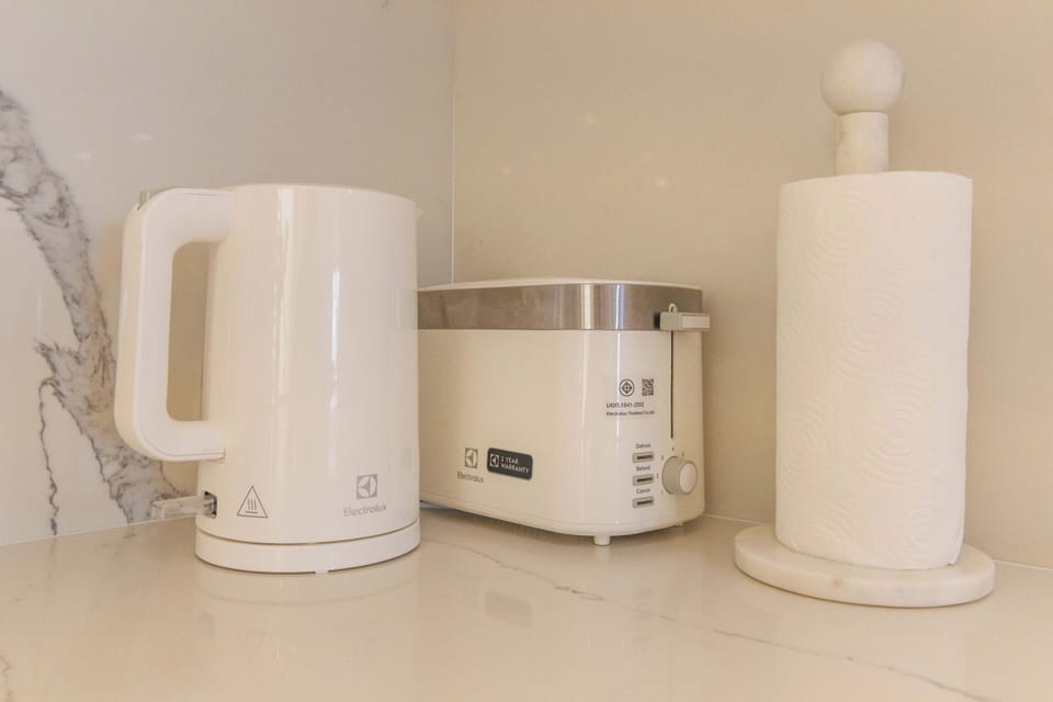 Luxury Apartment, Sea View | Private kitchen | Espresso maker, electric kettle, highchair