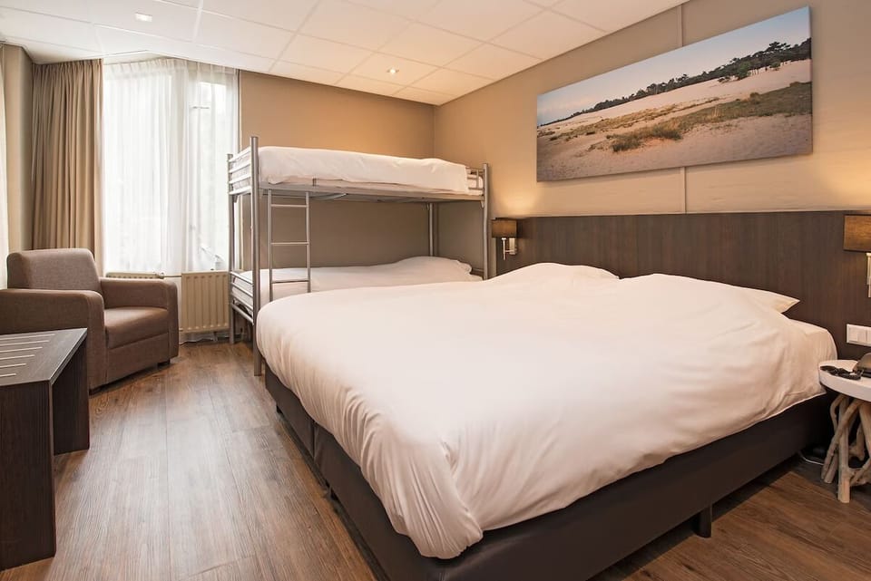Gather everyone comfortably with bunk beds and cozy seating corner