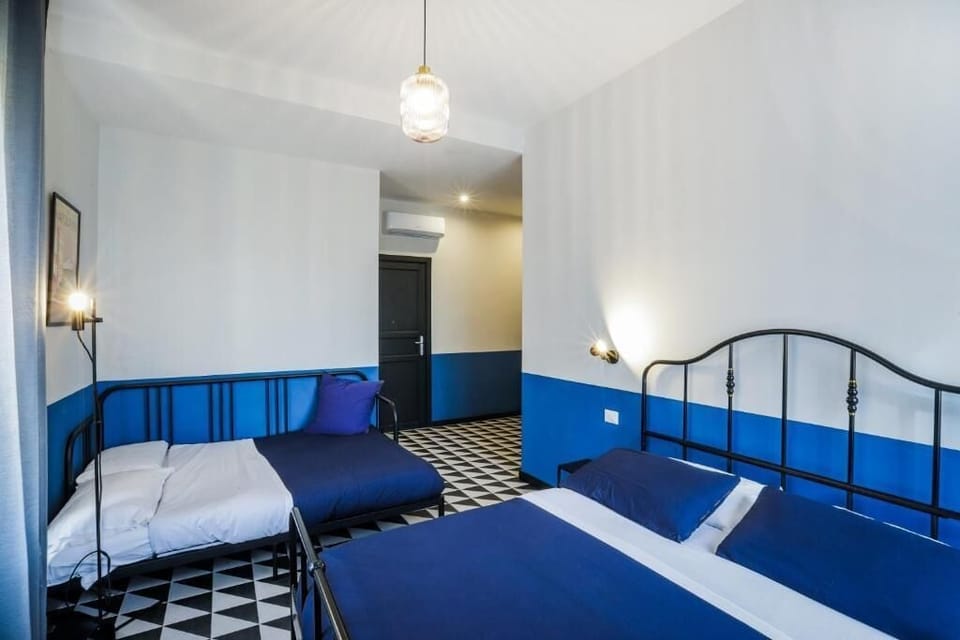 Comfort Quadruple Room, City View | Soundproofing, free WiFi
