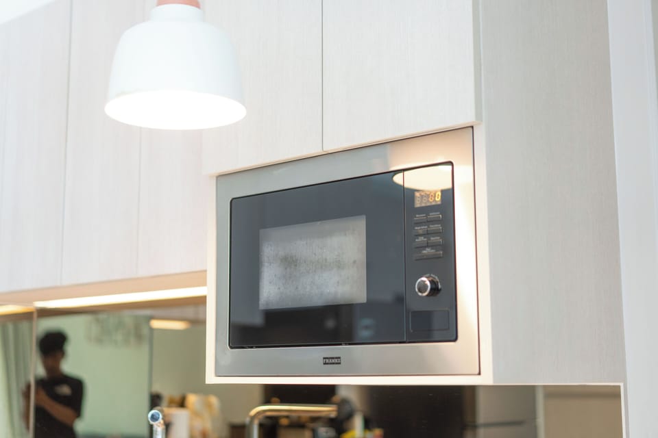 Deluxe Apartment, Balcony, Garden View | Private kitchen | Espresso maker, electric kettle, highchair