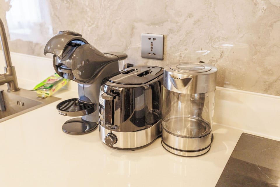 Classic Apartment, Balcony, Pool View | Private kitchen | Electric kettle, highchair