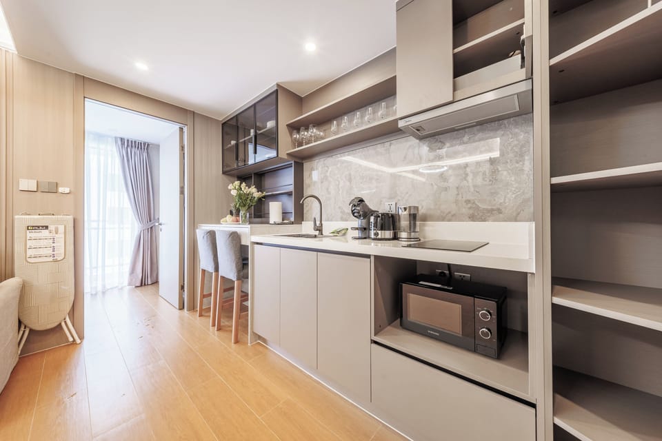 Classic Apartment, Balcony, Pool View | Private kitchen | Electric kettle, highchair