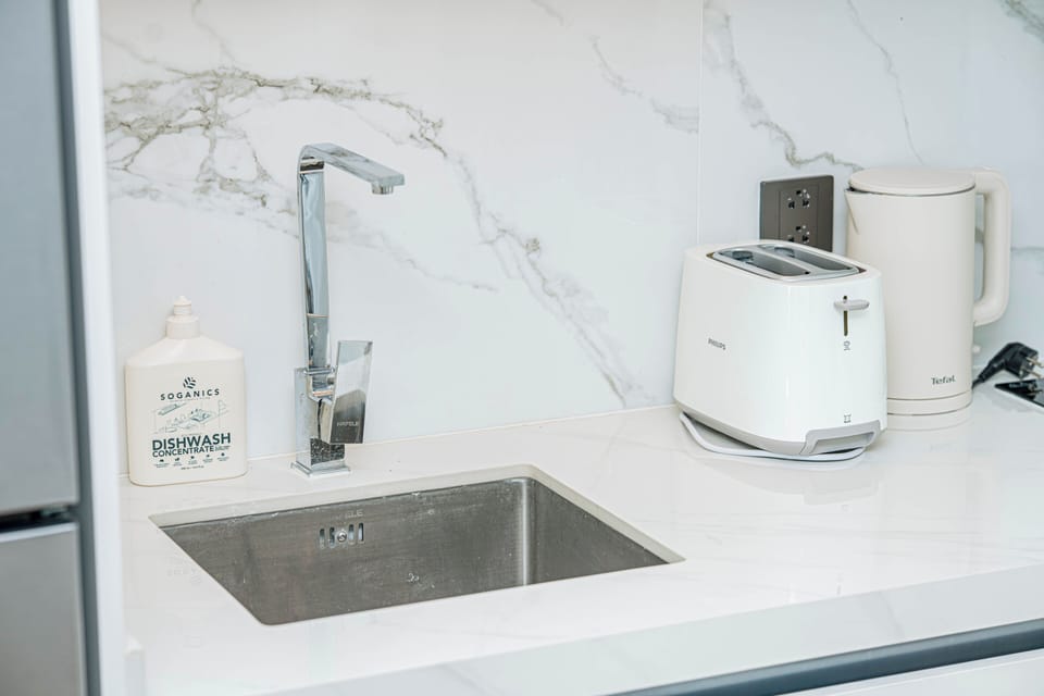 Classic Apartment, Balcony, Pool View | Private kitchen | Espresso maker, electric kettle, highchair