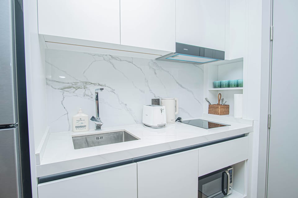 Classic Apartment, Balcony, Pool View | Private kitchen | Espresso maker, electric kettle, highchair