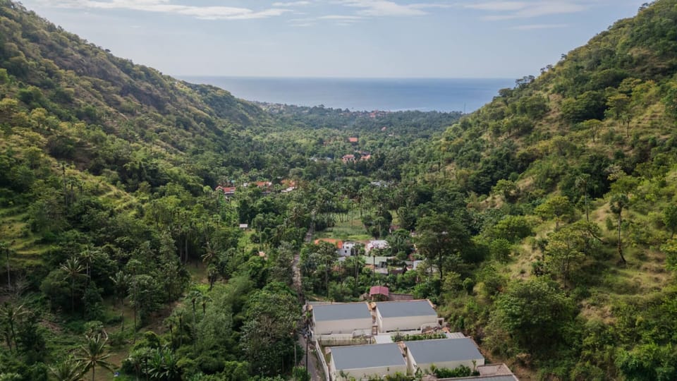 Elevated views of Amed's Celuke Valley looking down towards the Bali Sea