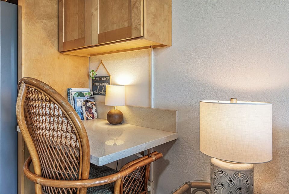 Your cozy work nook awaits with extra lighting and thoughtful touches for productive moments.